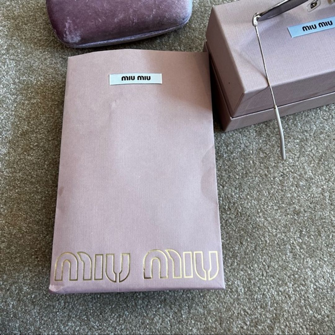 Miu Miu Circle Cat Eye Sunglasses