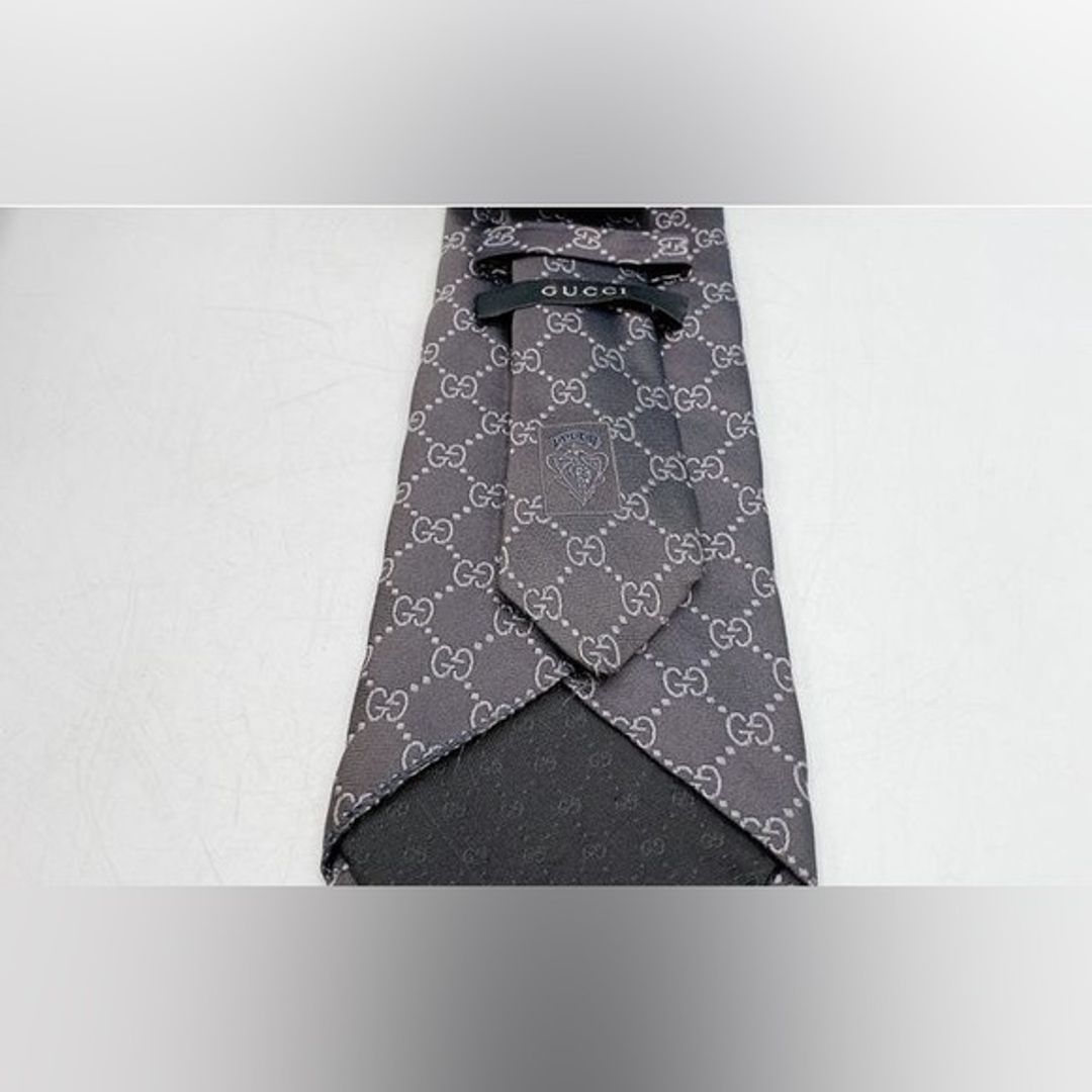 Gucci Vintage Y2K Tom Ford Era Black GG Guccissima Silk Tie w Box

Key Details:
Brand: Gucci
Size and Size Locale: One size, US
Color: Black
Category: Tie
Length: 59.25"
Width: 3"
Material: 100% Silk
Origin: Unknown
Pattern: GG Guccissima
Occasion: Business, formal wear
Special Features: Vintage Tom Ford era design, includes original box