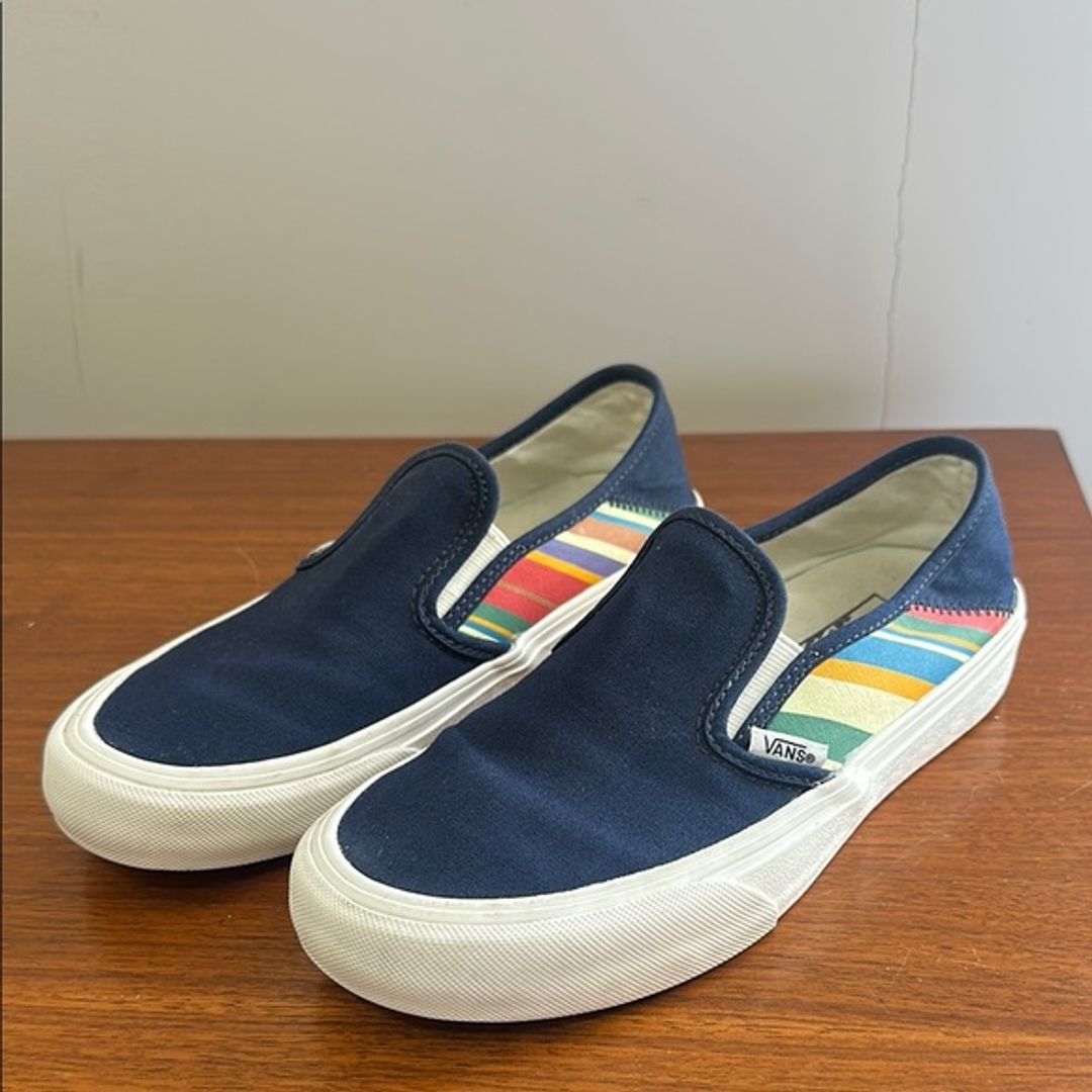 Vans Navy Slip-On Sneakers with Multicolor Stripes