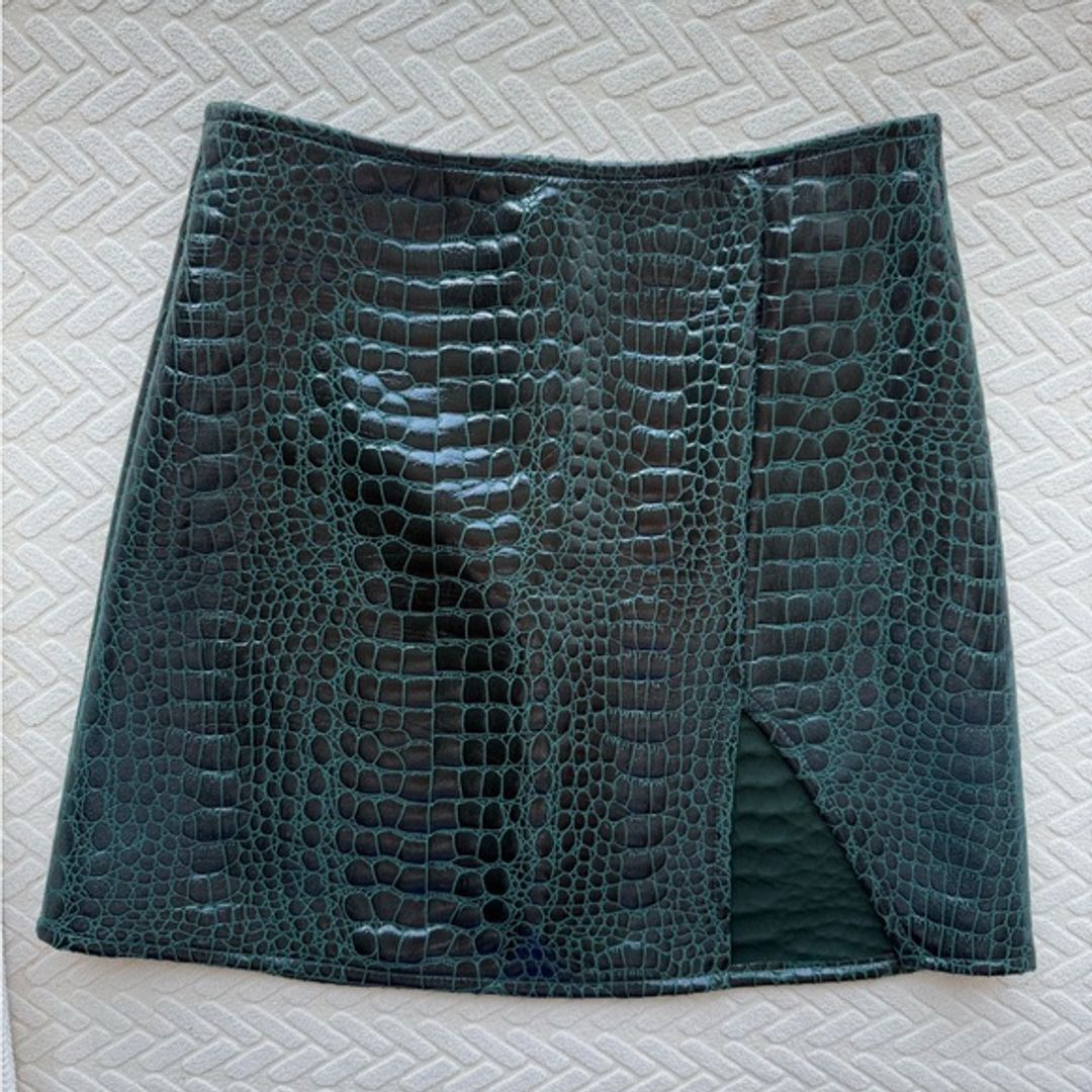 Green faux leather mini skirt with slit