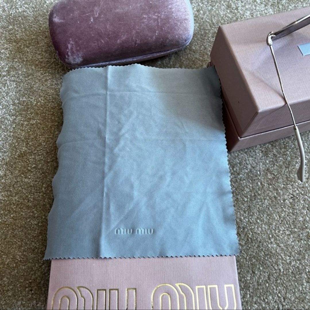 Miu Miu Circle Cat Eye Sunglasses