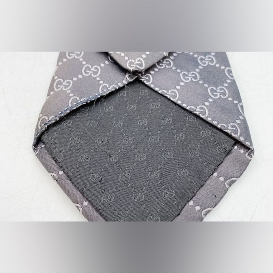 Gucci Vintage Y2K Tom Ford Era Black GG Guccissima Silk Tie w Box

Key Details:
Brand: Gucci
Size and Size Locale: One size, US
Color: Black
Category: Tie
Length: 59.25"
Width: 3"
Material: 100% Silk
Origin: Unknown
Pattern: GG Guccissima
Occasion: Business, formal wear
Special Features: Vintage Tom Ford era design, includes original box