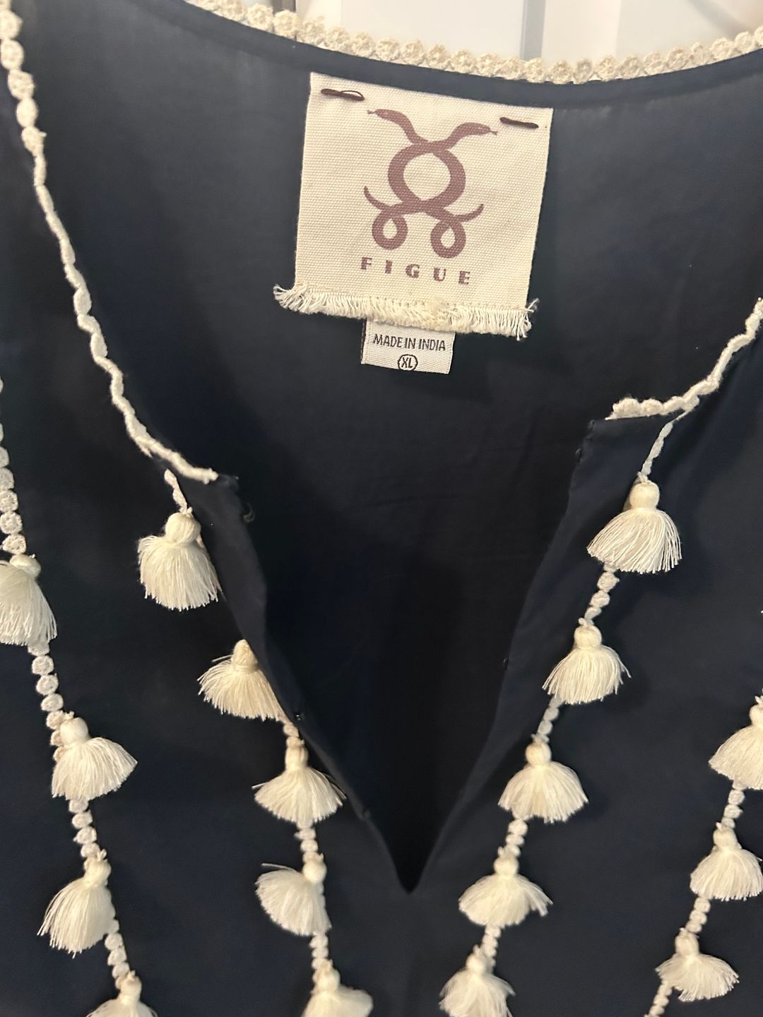 Figue navy tunic with fringe/ pompom around neck and sleeves