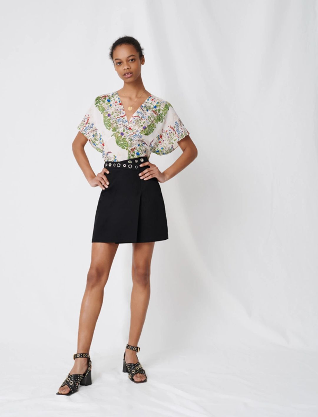 Wrap mini skirt with eyelets