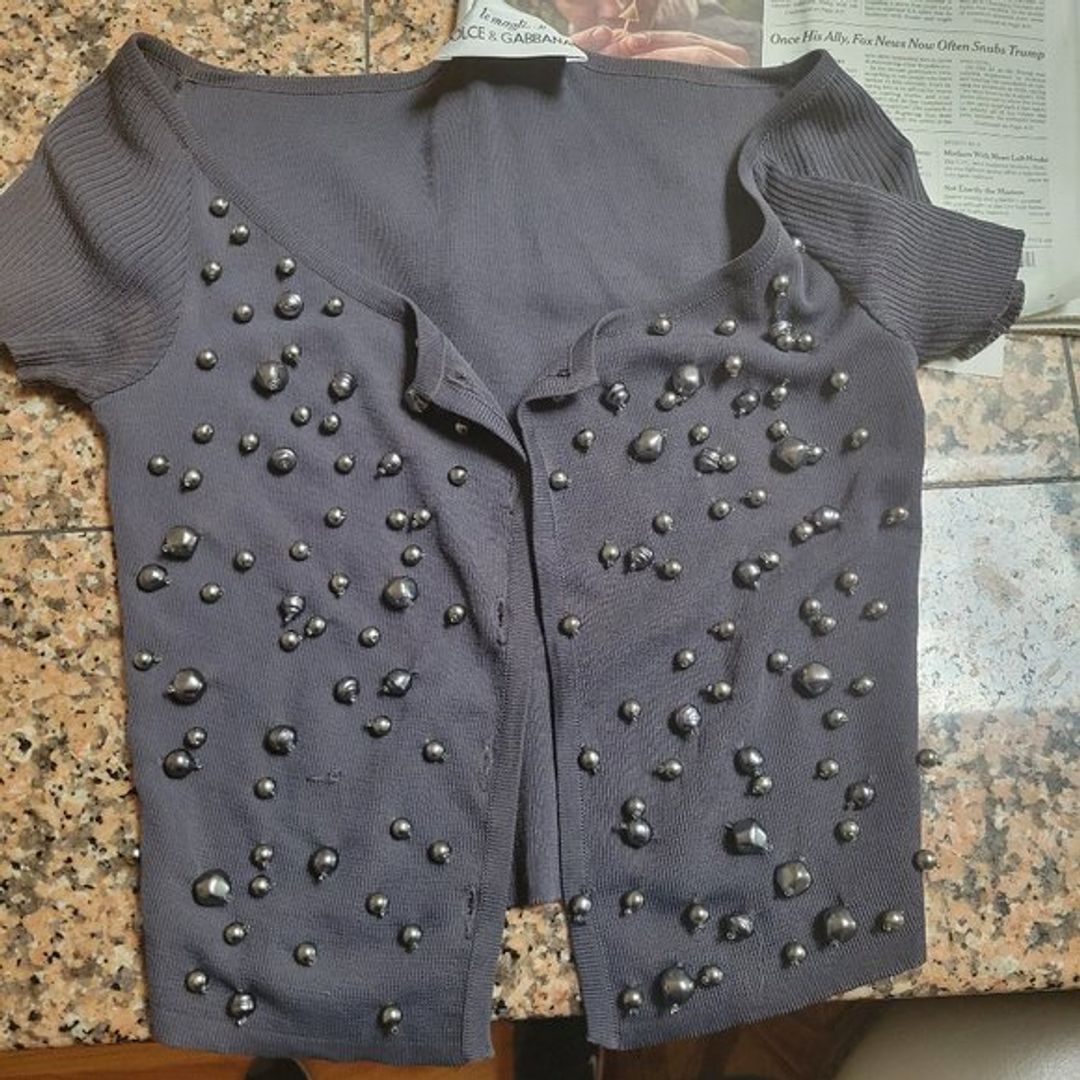 grey shrug with beads