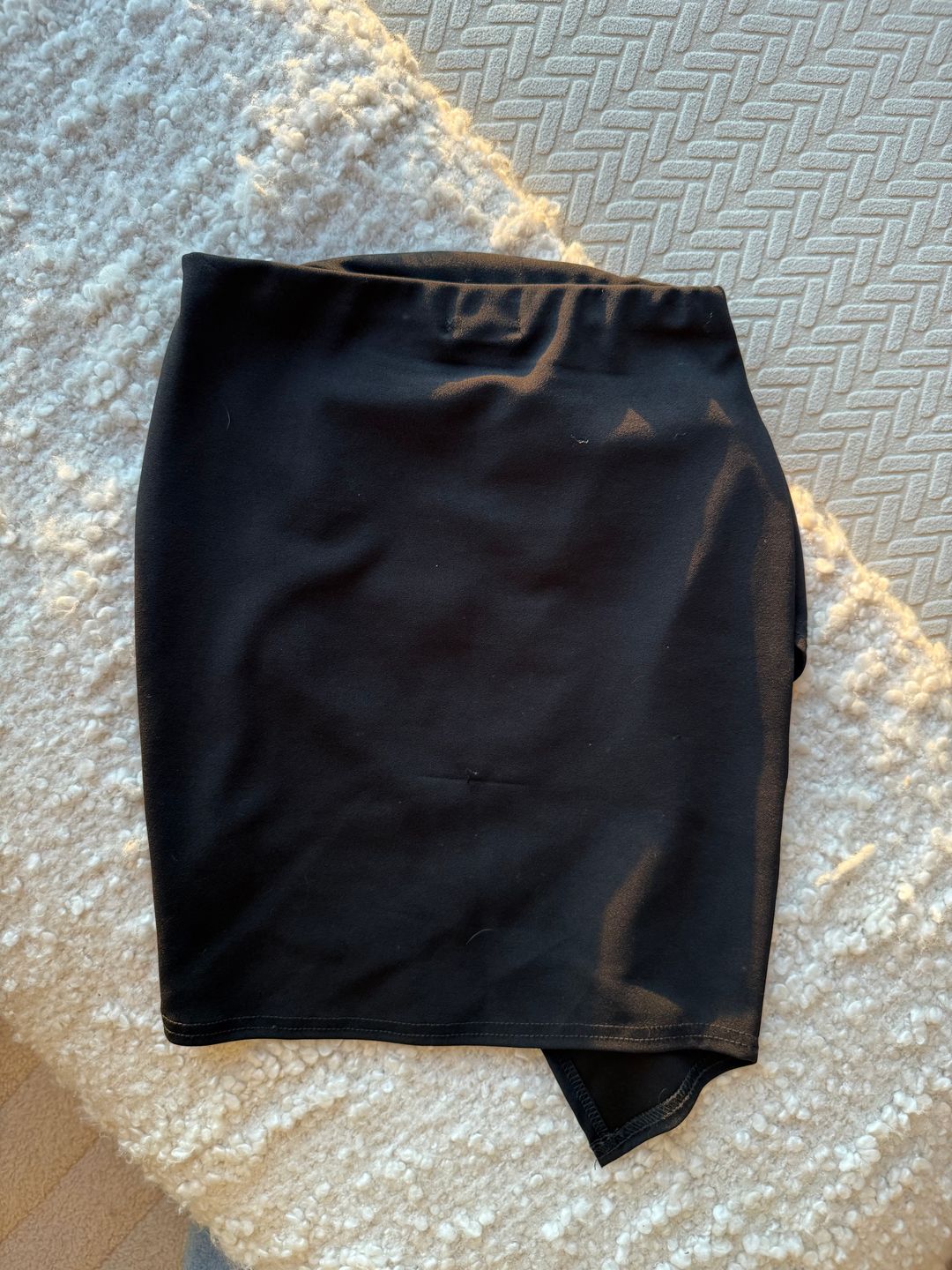 Asymmetrical black mini skirt