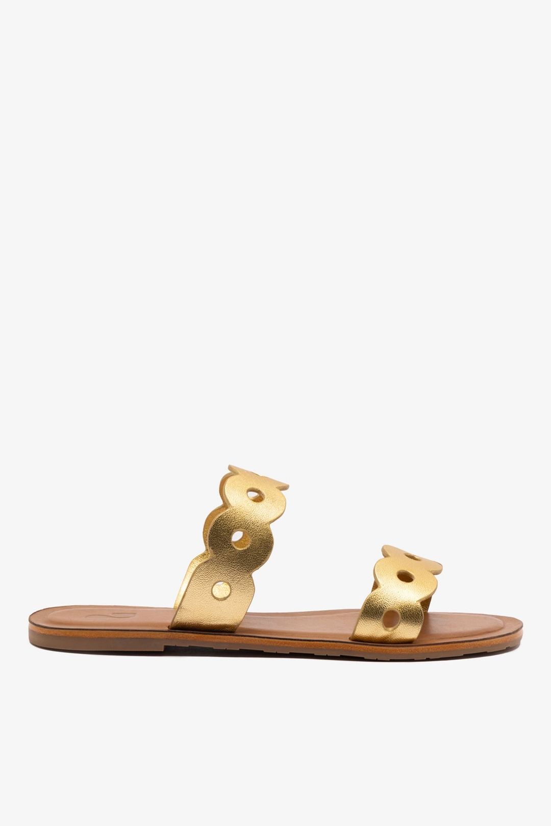 Florence Flat Mule In Gold Metallic Leather