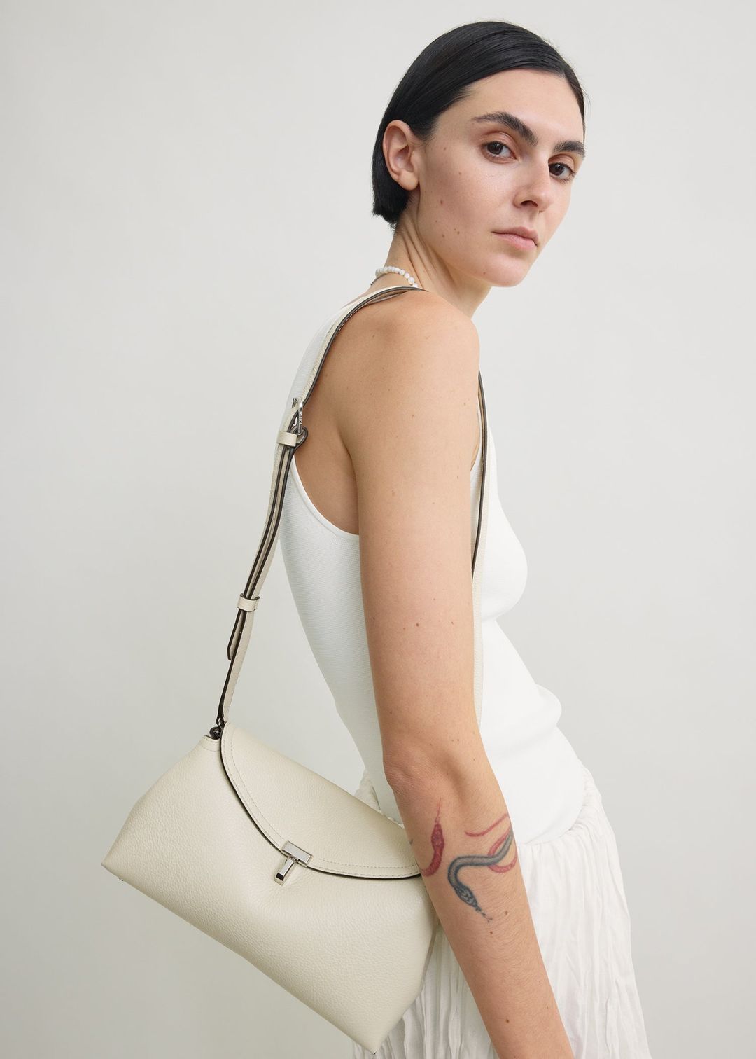T-lock grained-leather clutch milk #2