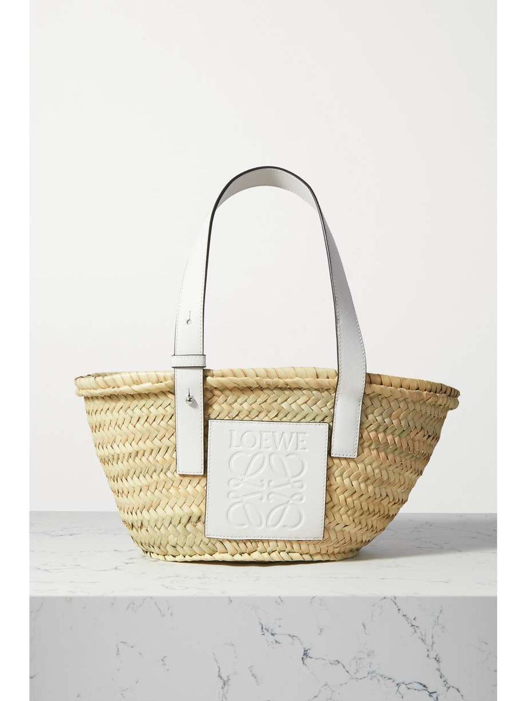 Small leather-trimmed woven raffia tote