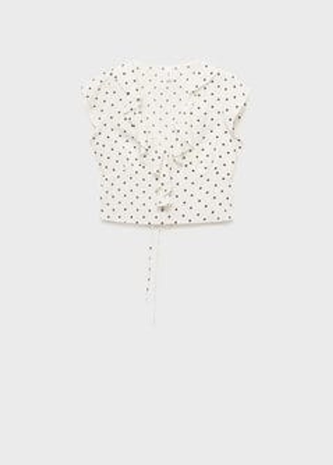 Polka-dot blouse with floral applique