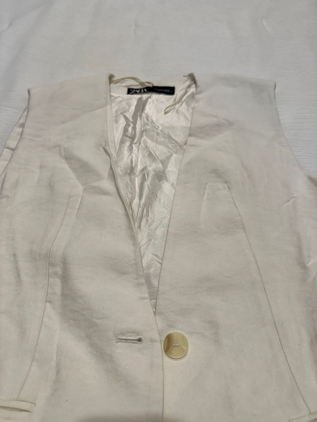 White vest