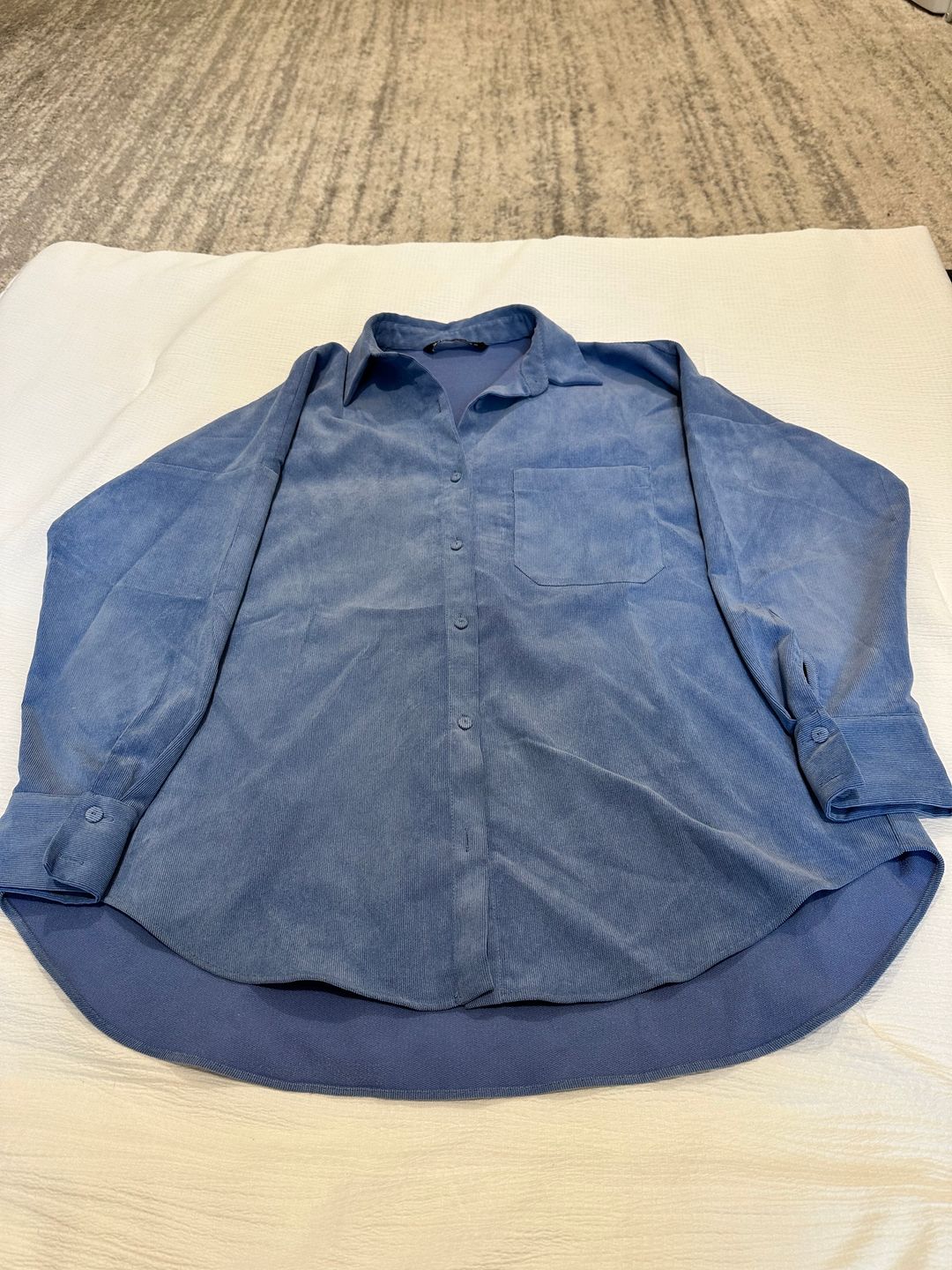 Blue button down shirt