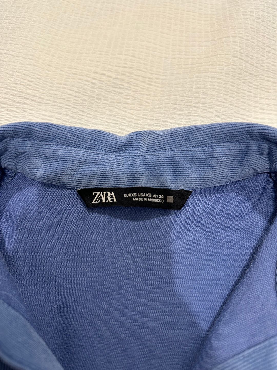 Blue button down shirt