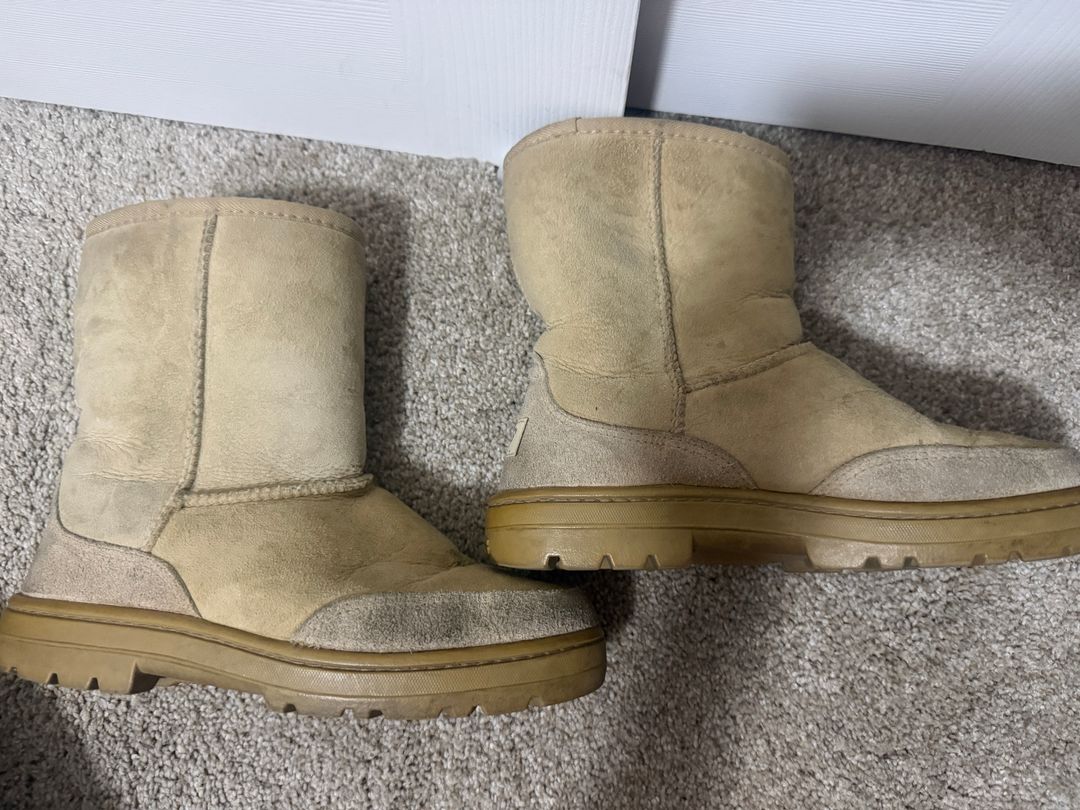 UGG Classic Ultra Mini Platform Boots in the “Sand” / beige suede colorway. chunky gum sole, oversized UGG tread pattern