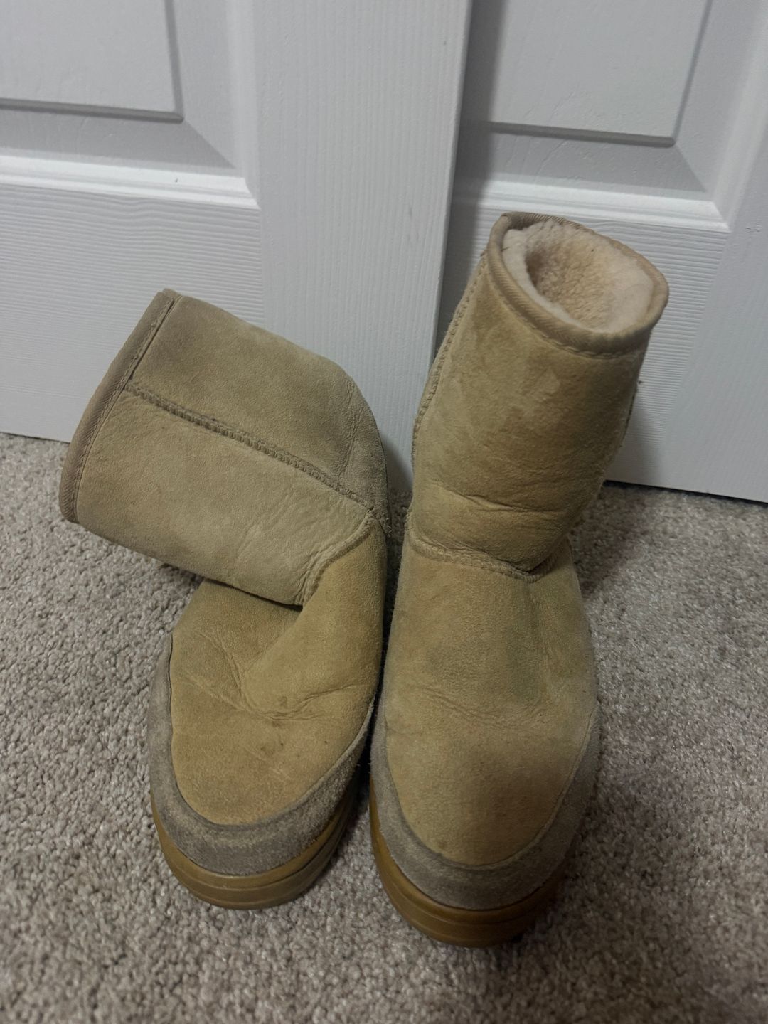 UGG Classic Ultra Mini Platform Boots in the “Sand” / beige suede colorway. chunky gum sole, oversized UGG tread pattern