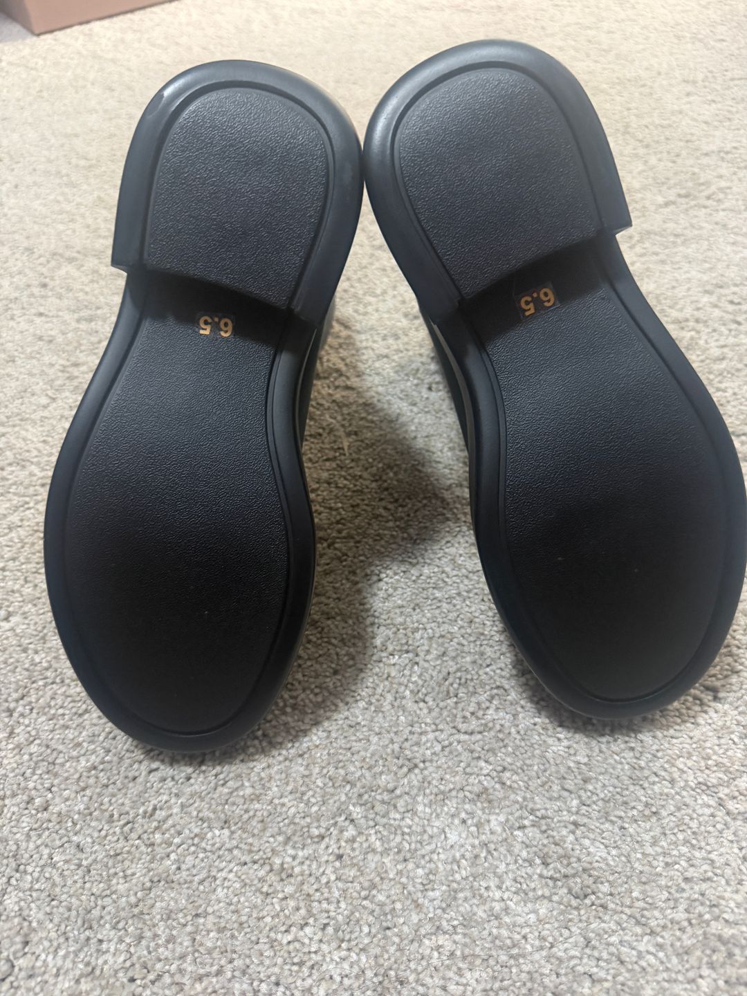 The Row's black ankle boots dupe