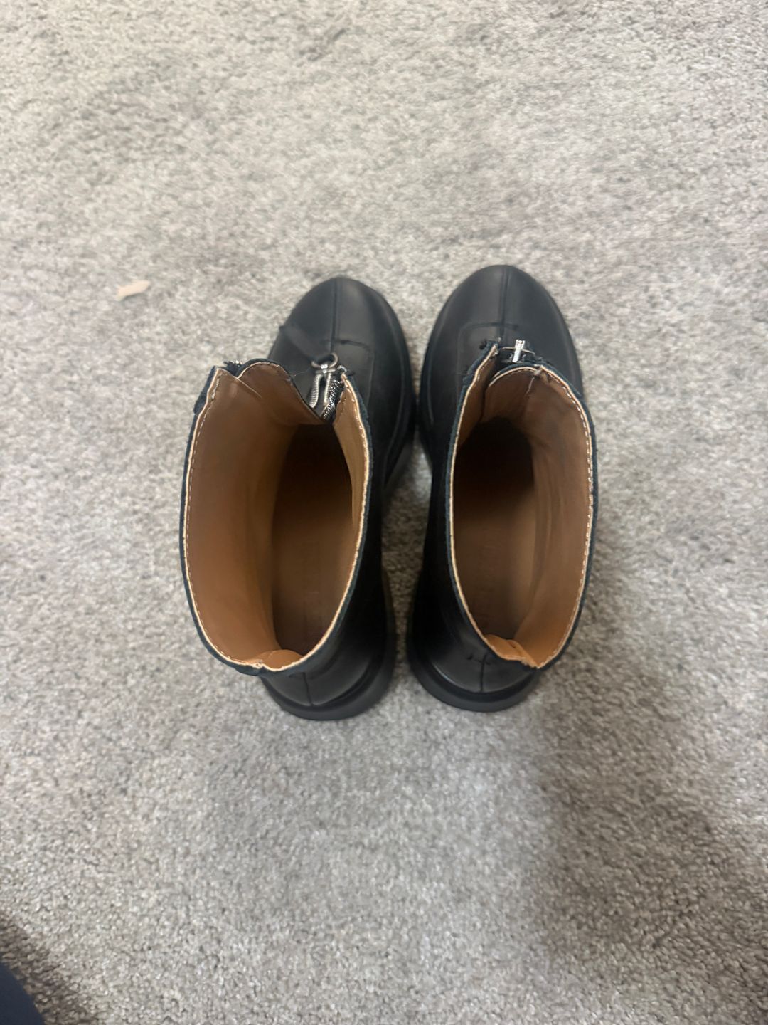 The Row's black ankle boots dupe