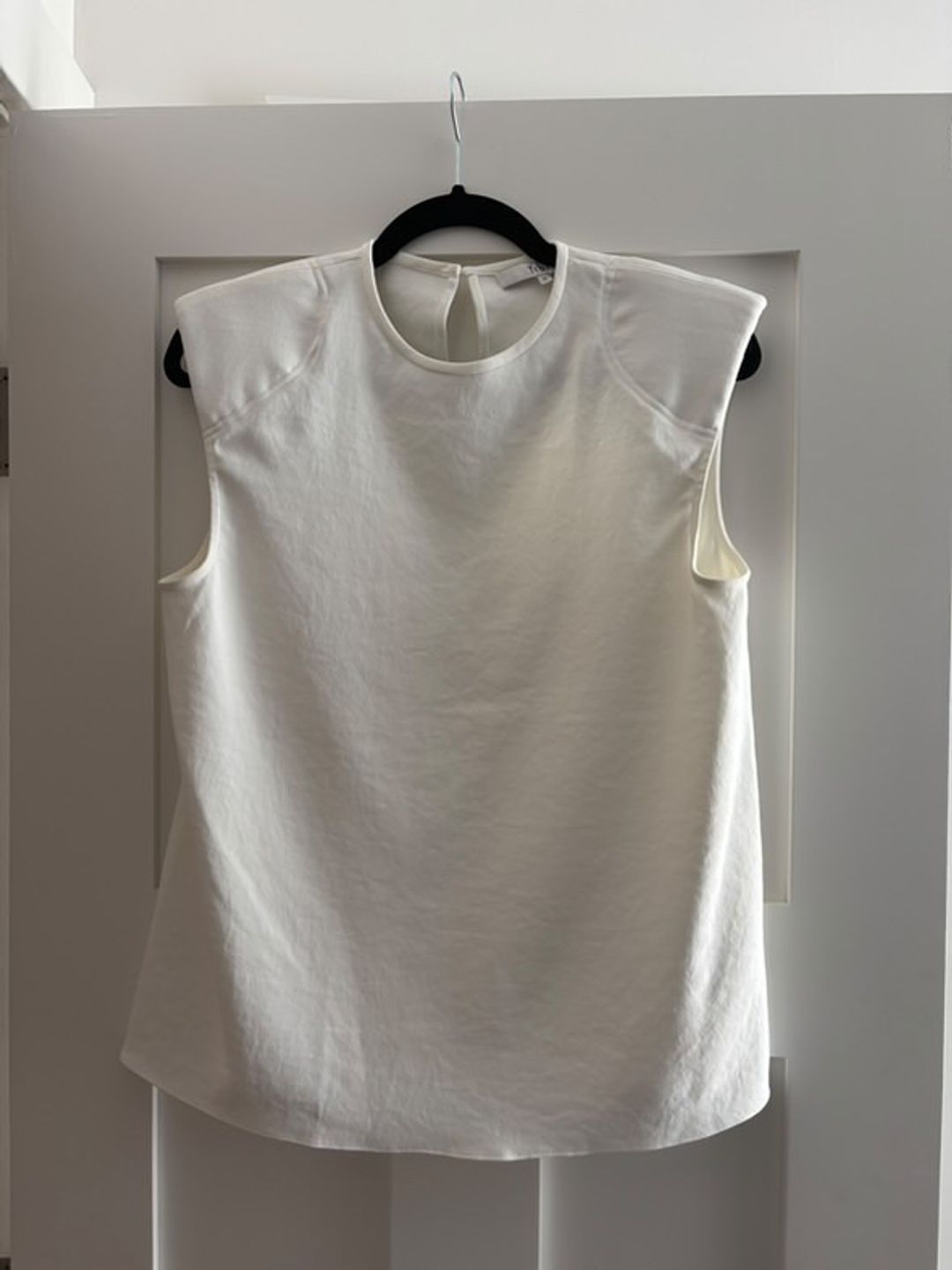 Chalky Drape Padded Shoulder Sleeveless Top