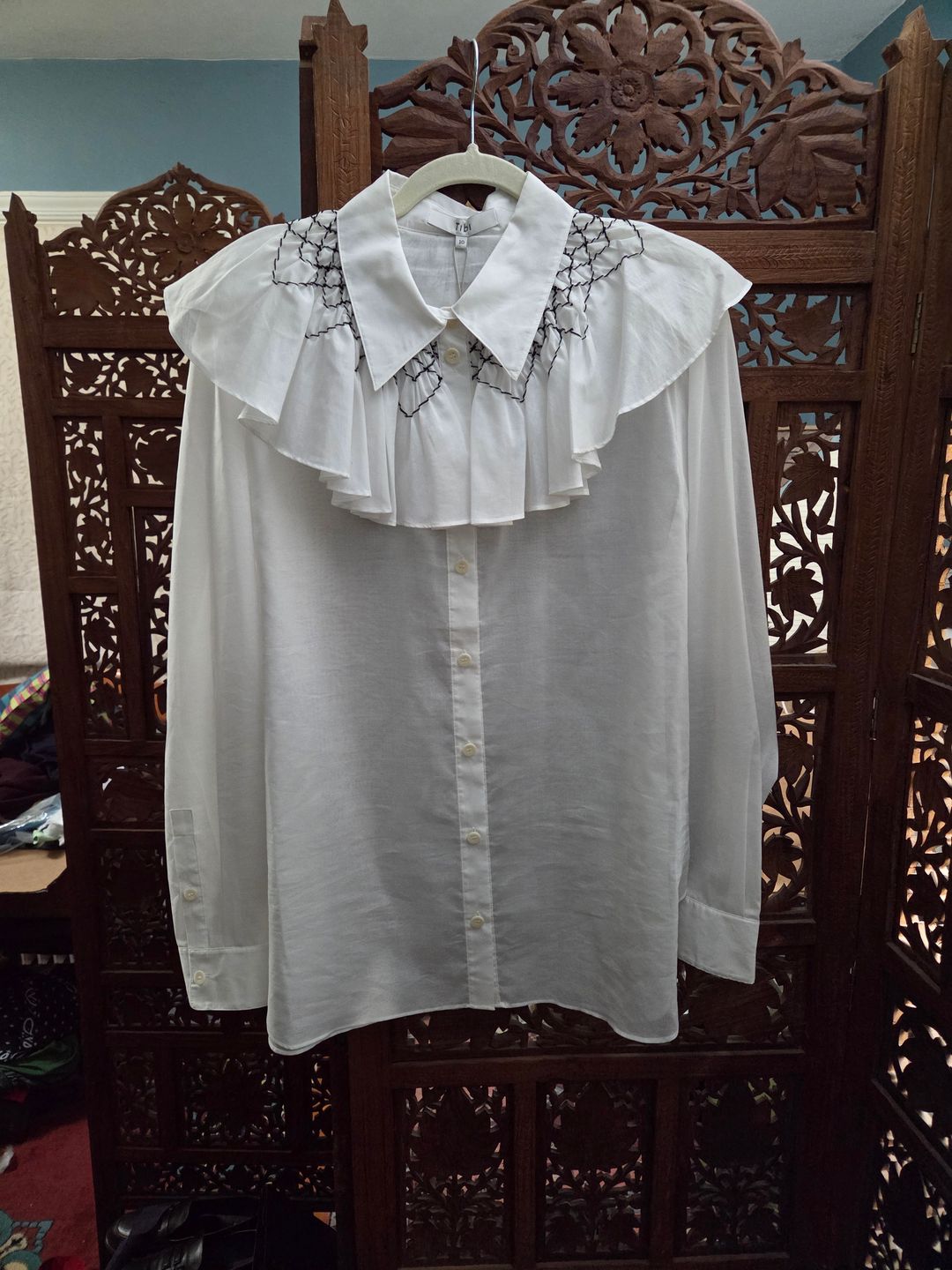 Emma Smocked Shirt White blouse with embroidered details
