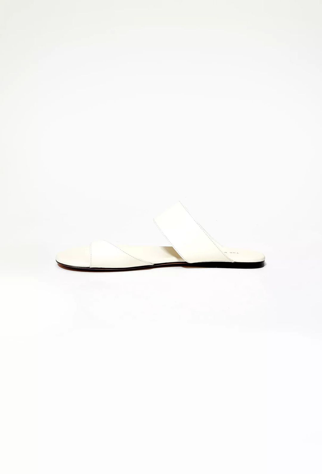 The Row Infradito Flat Leather Toe-strap Slide Sandals In Ivory