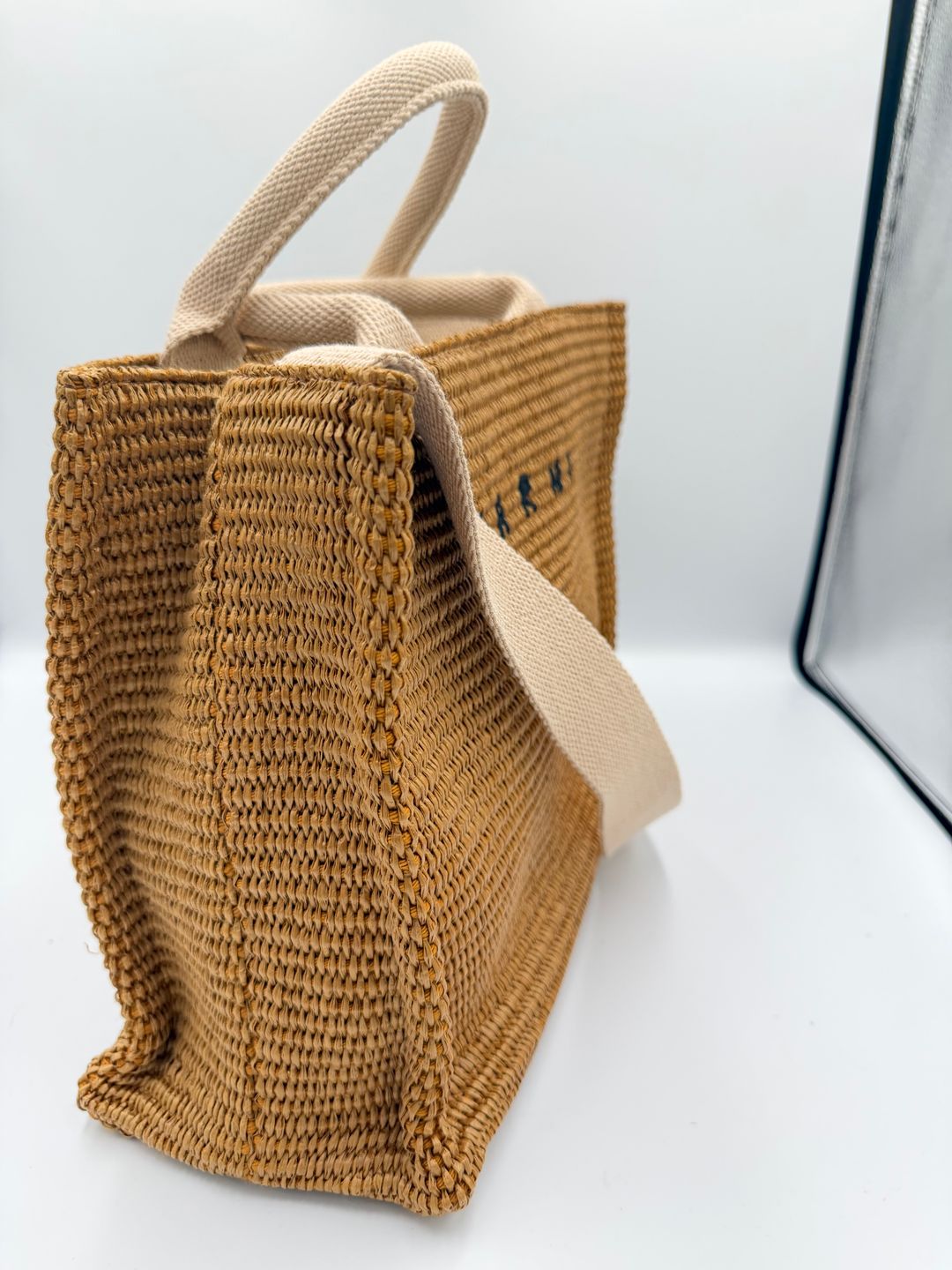 Natural-coloured raffia-effect Small Tote
https://www.marni.com/en-us/shopping-bags-SHMP0077U0P3860Z0R42.html