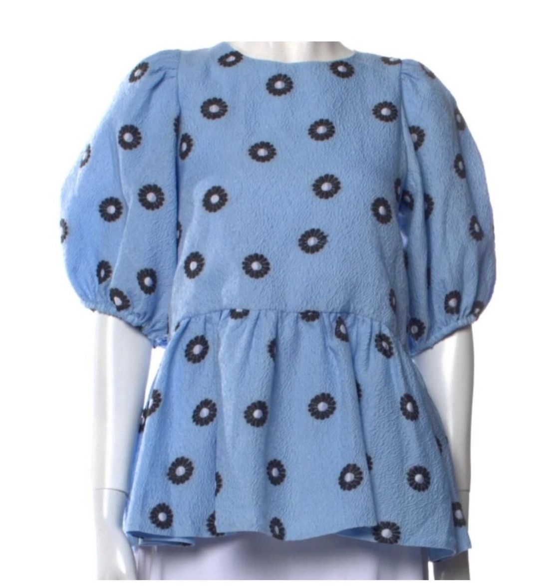 Blue peplum blouse with floral pattern