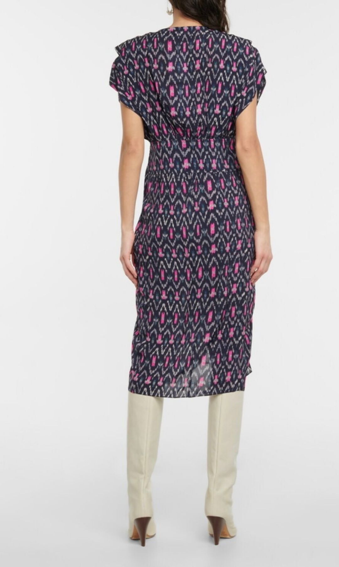 Mid length dress patterned with Ikat print and banded at the waist.