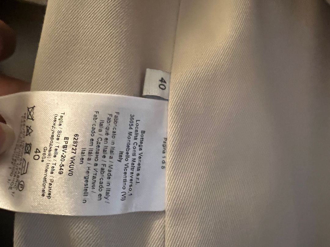 Deconstructed trench coat with layered front flap