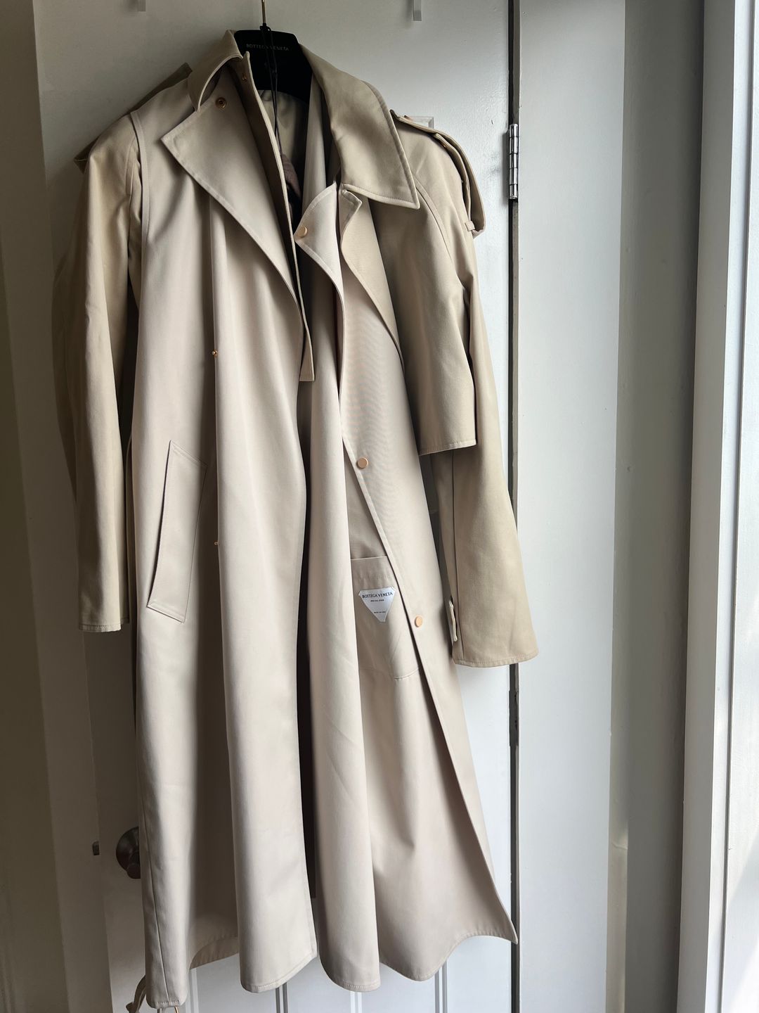 Deconstructed trench coat with layered front flap