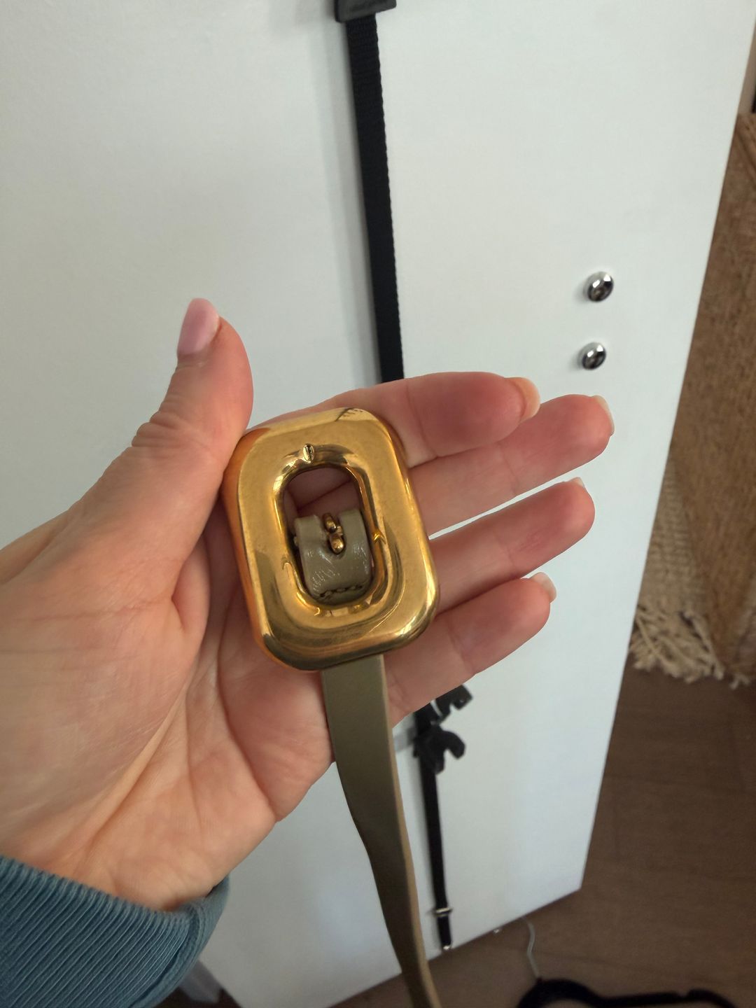 belt with gold buckle