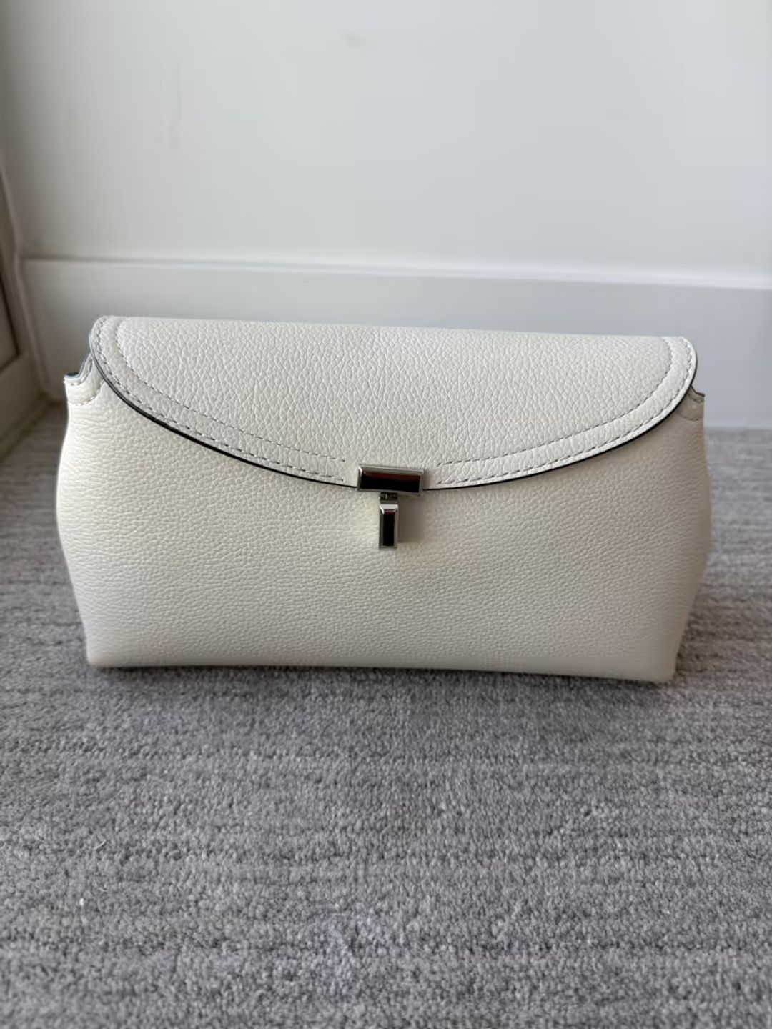 T-Lock grained-leather clutch milk