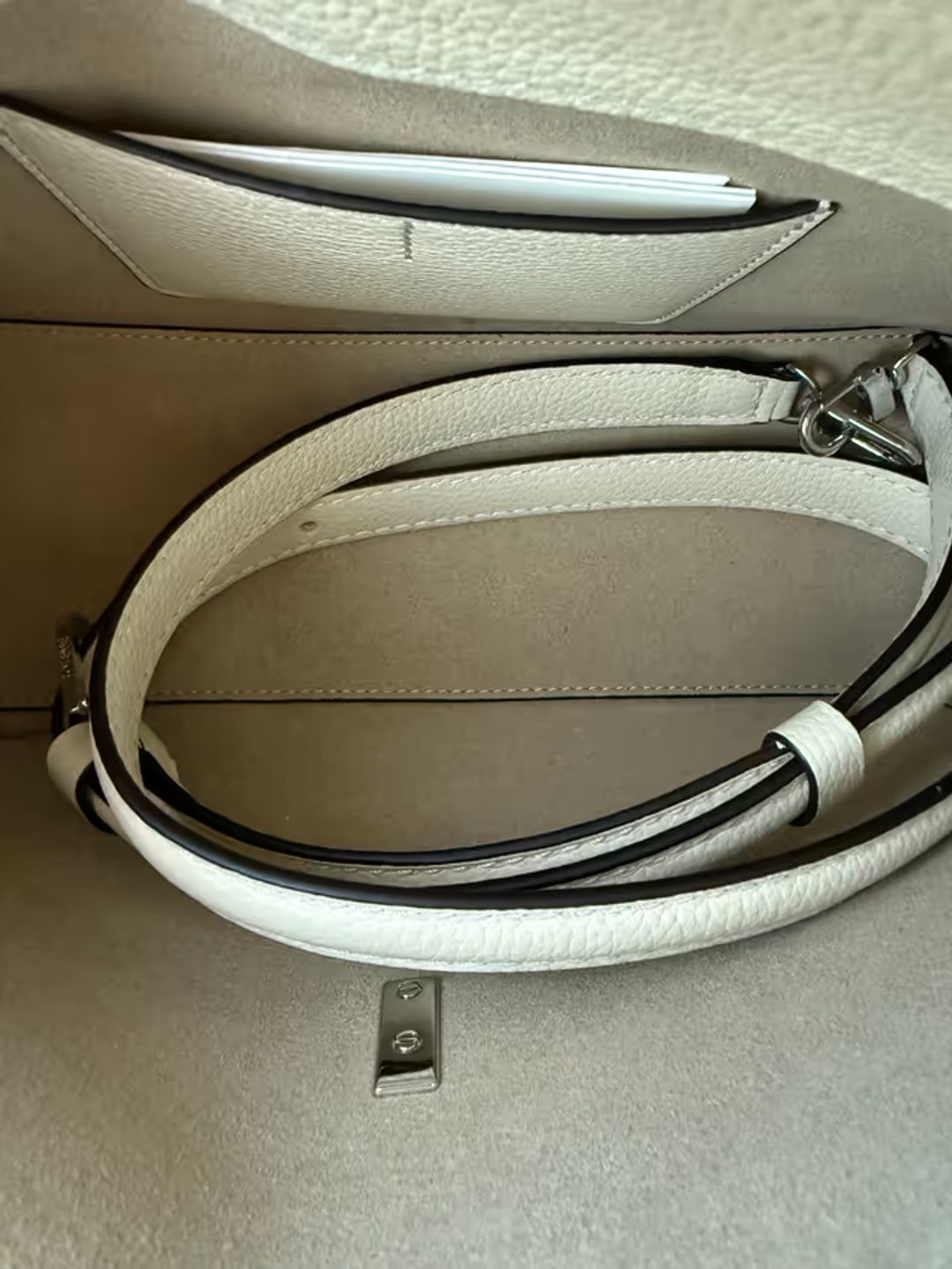 T-Lock grained-leather clutch milk