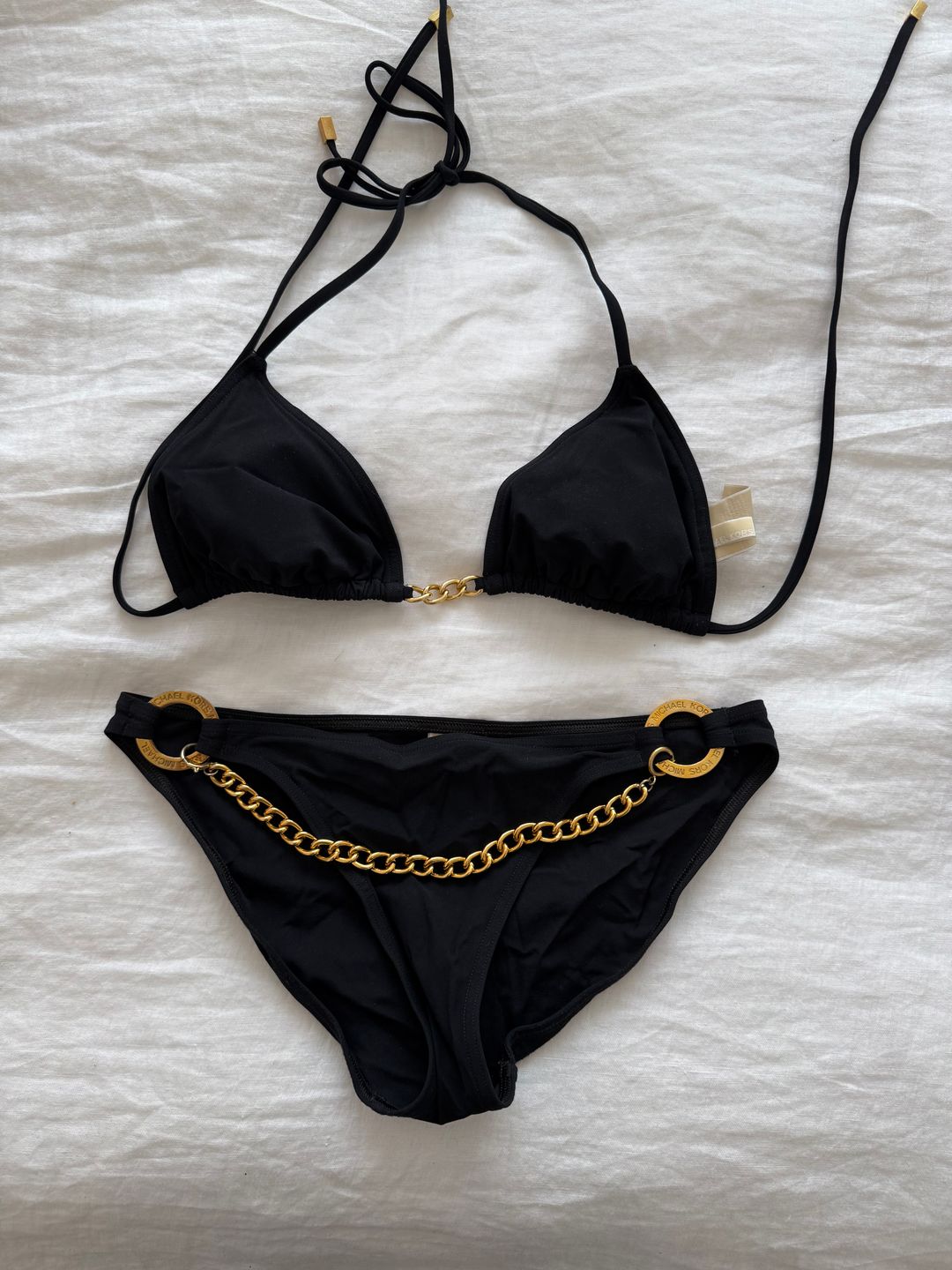 black bikini bottoms with gold chain