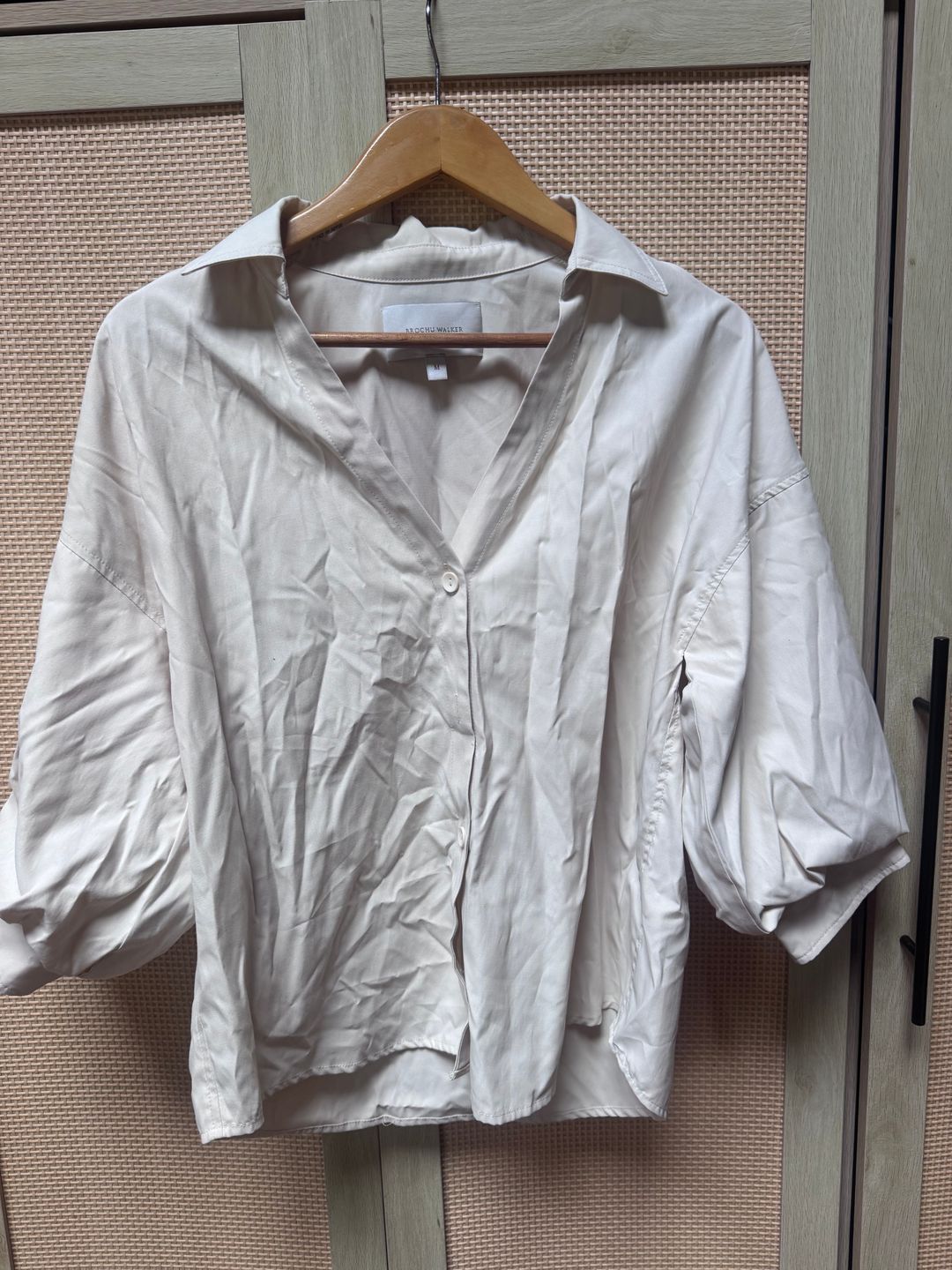 Cream blouse with bell sleeves