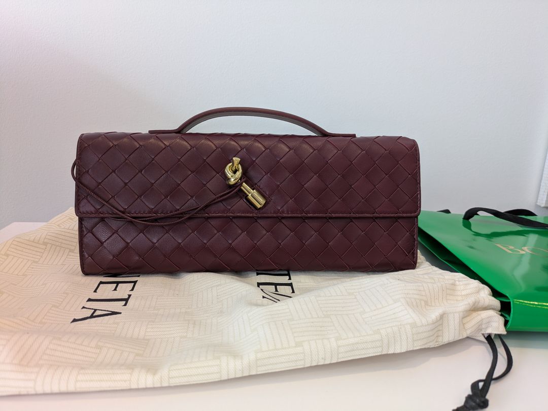 Long Andiamo intrecciato leather clutch