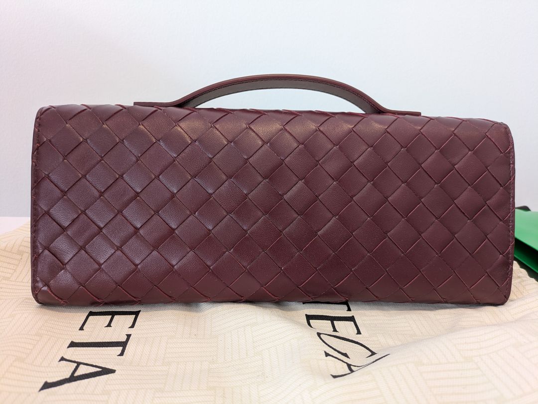 Long Andiamo intrecciato leather clutch
