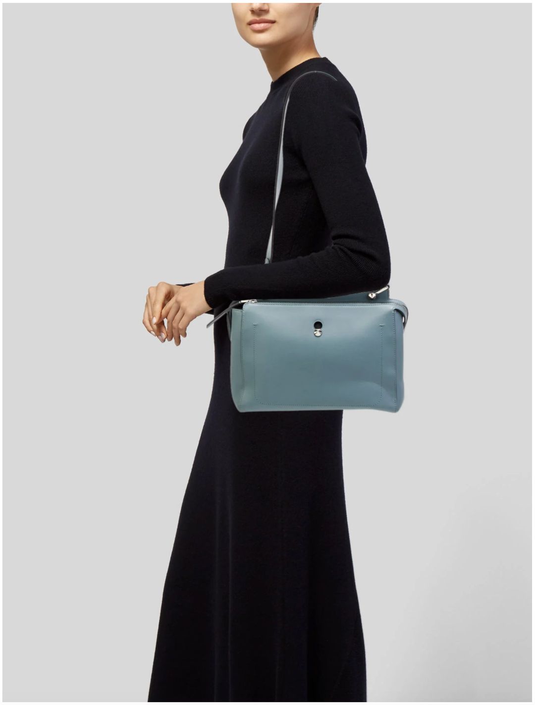 Fendi Fendi Leather Dotcom Medium top handle bag from the 2016 Collection by Karl Lagerfeld. Blue leather with silver-tone hardware. Flat handle and single shoulder strap. Suede lining and dual interior pockets. Zip closure at top. Protective feet at base and INCLUDES DUST BAG. 