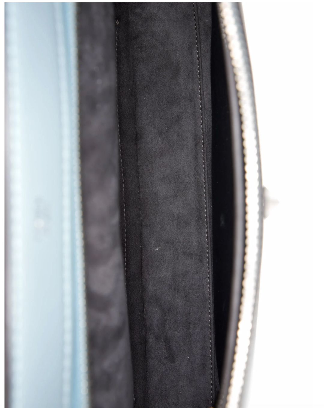 Fendi Fendi Leather Dotcom Medium top handle bag from the 2016 Collection by Karl Lagerfeld. Blue leather with silver-tone hardware. Flat handle and single shoulder strap. Suede lining and dual interior pockets. Zip closure at top. Protective feet at base and INCLUDES DUST BAG. 